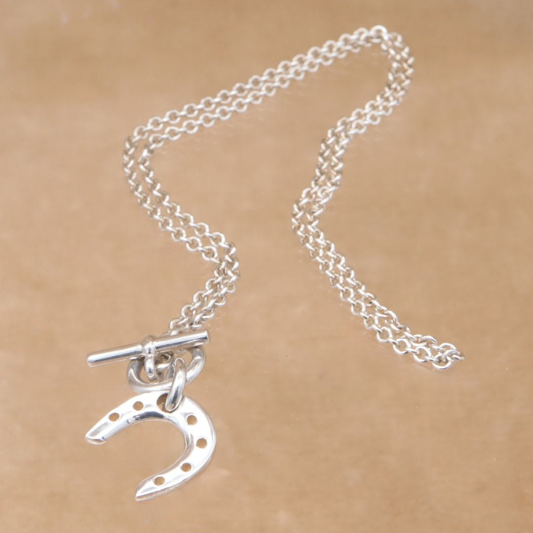 HERMES Horseshoe pendant