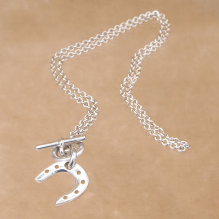 HERMES Horseshoe pendant